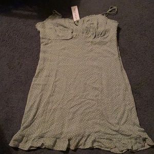 green dress with white flowers.